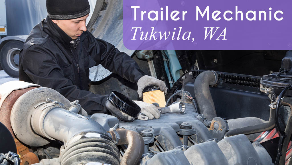 Man wearing black hat, coat and gloves works on a vehicle. Text reads: Trailer Mechanic, Tukwila, WA