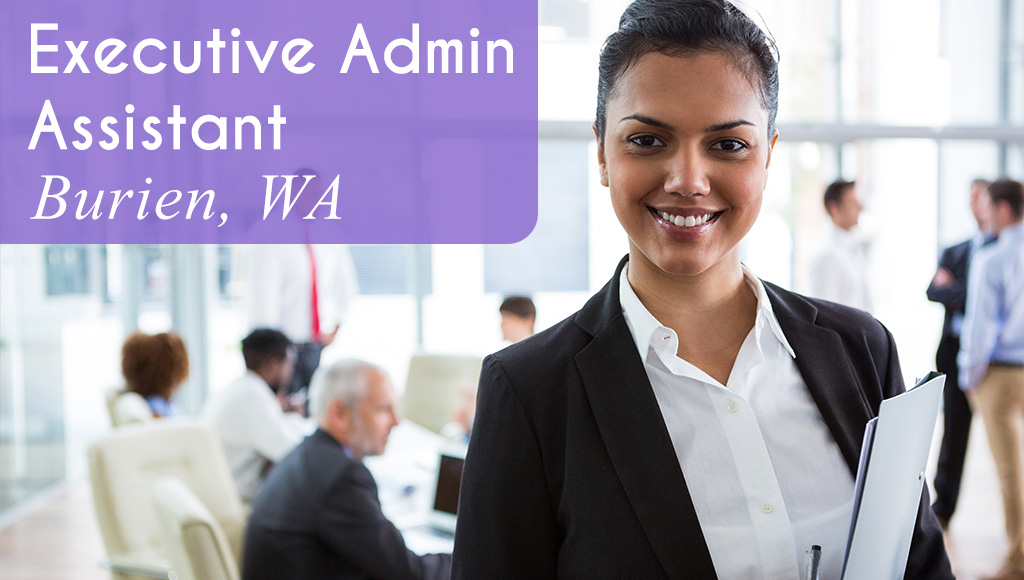 A woman in professional attire holds a clipboard and smiles. Executives collaborate at a conference table in the background. White text over a purple banner reads: 'Executive Admin Assistant in Burien, WA.