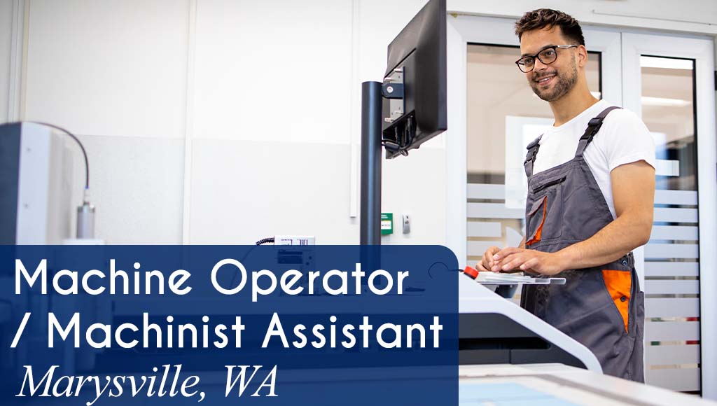 A smiling man operates a CNC machine in a production environment. White text over a blue banner reads: 'Machine Operator / Machinist Assistant in Marysville, WA.'