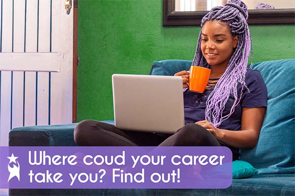 Woman with purple braids seated on a blue couch, smiling at her laptop while holding a coffee cup, with a green wall and mirror in the background. Text overlay reads: “Where could your career take you? Find out!”